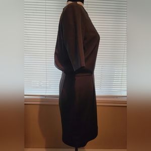 5/30$ Icône slit back black dress